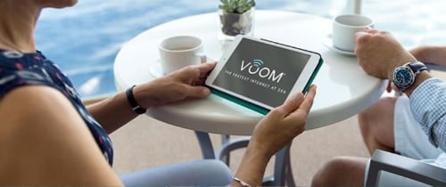 Lady holding tablet highlighting Voom